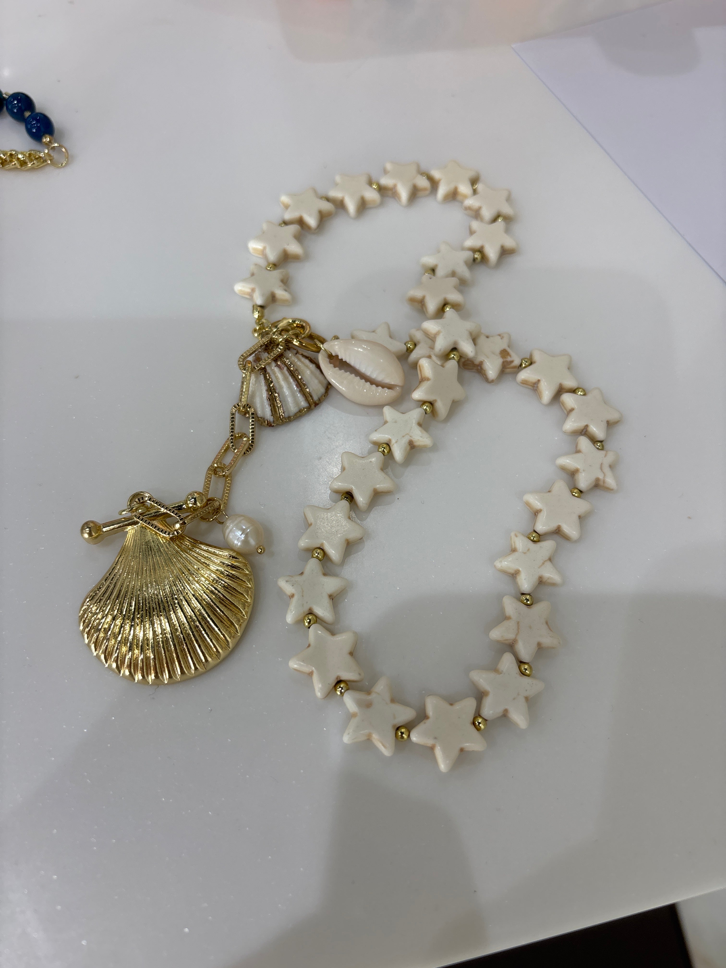 Necklace star gold plated shell