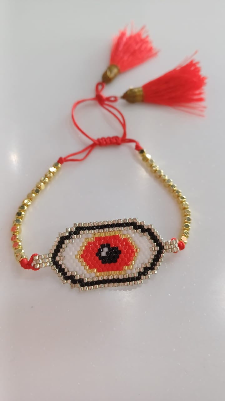 Bracelet evil eye white and red or blue cord gold