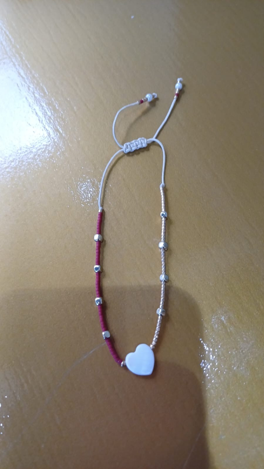 Bracelet red with nacar heart