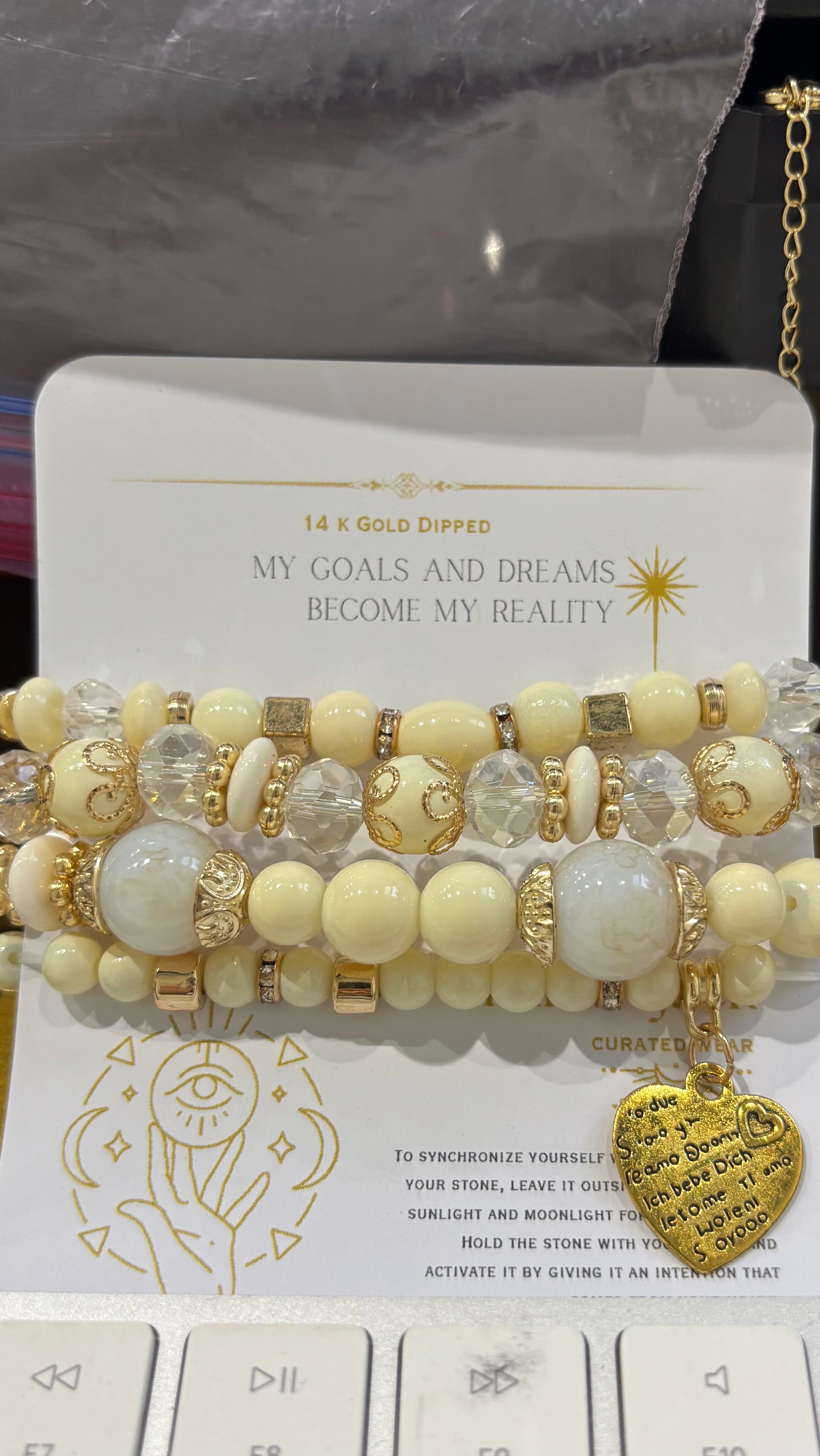 Bracelet Set Beige of 4 heart pendant